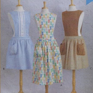 K4281 Kwik Sew - Misses wrap-around design with button closure has pockets and length variations  - new sewing pattern - sz A (XS-XL)