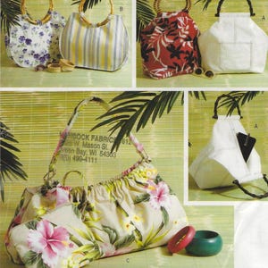 May include: Four different styles of tote bags with bamboo handles. The bags are made of fabric and feature various floral and striped patterns. The bags are displayed on a green and brown background.