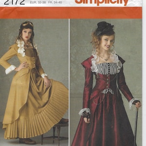 May include: Simplicity pattern 2172 for size HH, featuring two women's costume designs. The pattern includes sizes 6, 8, 10, and 12. The image shows a mustard yellow and a burgundy dress with pleated skirts.