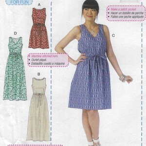 May include: A sewing pattern for beginner dresses. The image shows a woman wearing a blue patterned dress, with examples of other dress designs. Text includes "Learn to Sew for Fun" and "Easy to sew, no zipper!"