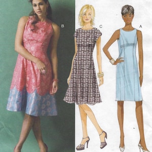 May include: A sewing pattern illustration featuring three sleeveless dress designs. Design B is a pink and blue floral dress with a scalloped hem. Design C is a dark patterned dress with short sleeves. Design A is a solid light blue sheath dress.