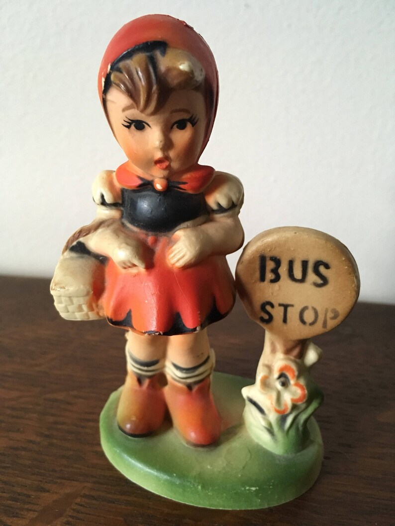 Hummel girl at bus stop figurine. 1970s. Made in Hong Kong