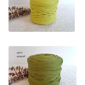 May include: Two spools of fabric yarn in shades of green. The top spool is a bright pistachio green, and the bottom spool is a darker avocado green. The text "vert pistache" and "vert avocat" are visible.