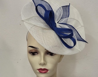 Off-white, ivory, and royal blue sisal fascinator in a leaf bouquet design, perfect for weddings. Custom-made item.