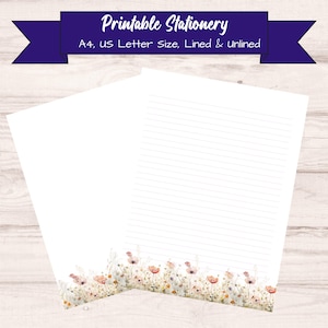 Peut inclure: Deux feuilles de papeterie imprimable, l'une lign&eacute;e et l'autre vierge, avec une bordure florale de fleurs roses et oranges. La banni&egrave;re sup&eacute;rieure indique "Papeterie imprimable". Le papier est de format A4.