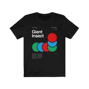 May include: Black t-shirt with a graphic design of a colorful caterpillar and the text "Giant Insect" and "Fourth Level Transmutation".