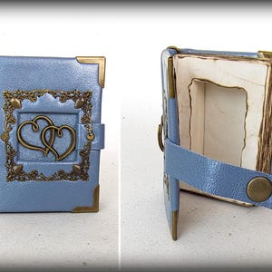 Mini leren boeksleutelhanger: ringdoos met geheim compartiment