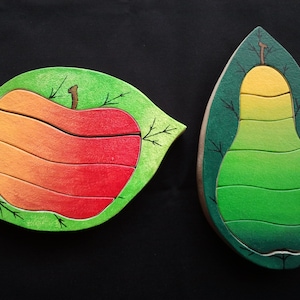 Apple wood and multicolor wooden pear.
