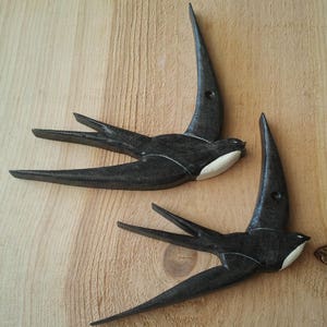 Swallows for home façade decoration.