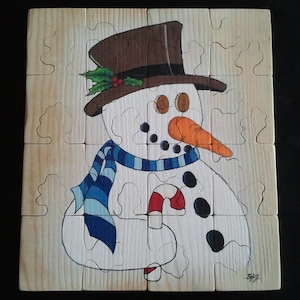 Puzzle &quot;Snowman&quot; z kapelusza i nosa marchew