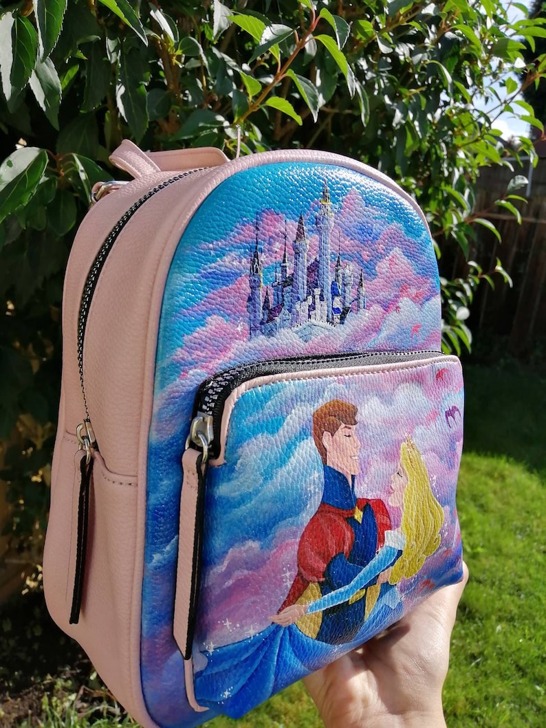 24 Unique Disney Gift Ideas featured by top US Disney blogger, Marcie and the Mouse Original Handpainted Disney Sleeping Beauty Backpack Aurora image 0