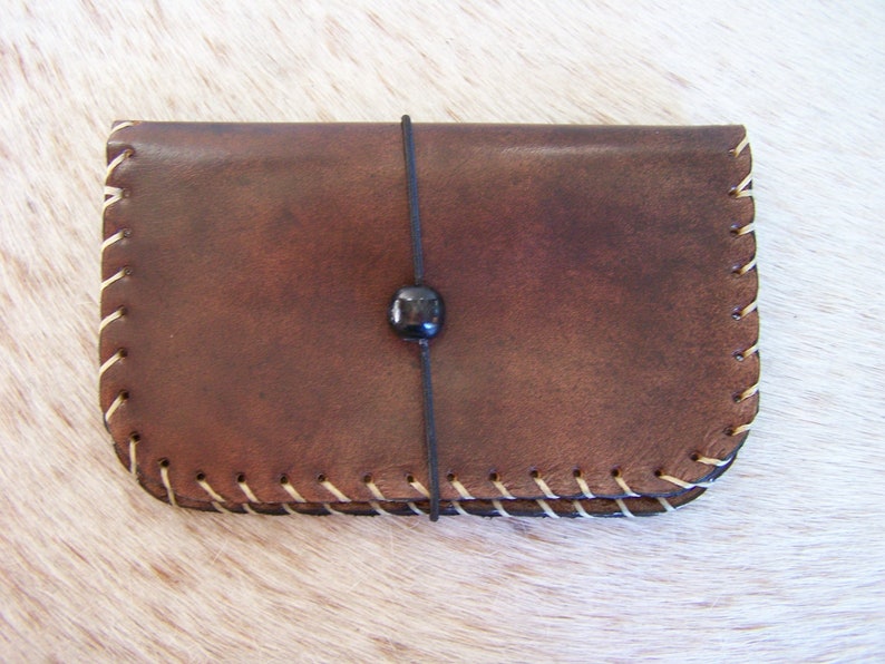 Joke to tobacco in brown leather