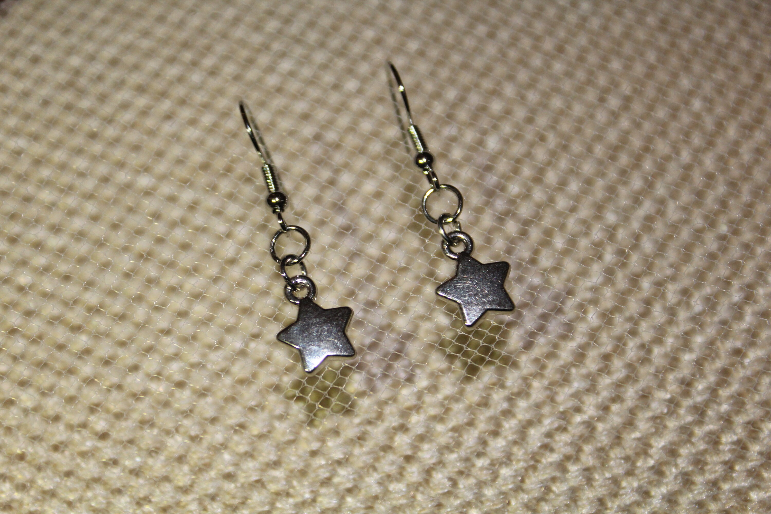 Silver star dangle earrings edgy earrings alt jewelry Etsy