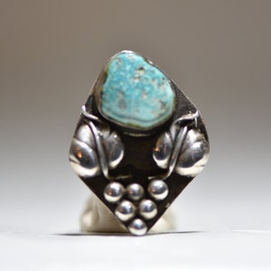 Anello turchese Navajo lascia floreale in argento sterling