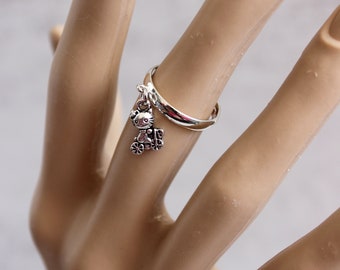 Silver tone charm ring. Adjustable ring for all sizes. Charm ring. Gift for her.  Women's ring. Cat on a bike ring. Dangle ring