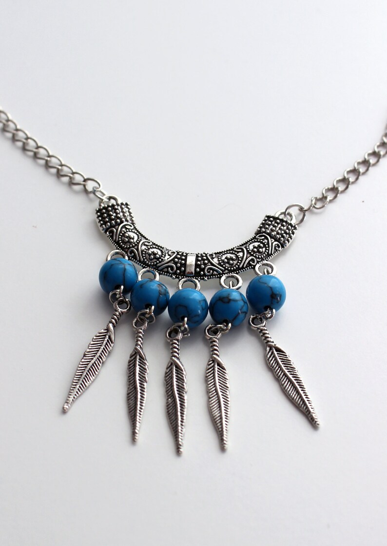 Chain and pendant Jewelry set Turquoise stones and feather charms Handmade necklace and french hook dangle earrings. Silver tone