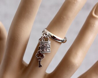 Silver tone charm ring. Adjustable ring for all sizes. Charm ring. Gift for her.  Women&#39;s ring. Key and lock ring. Dangle ring