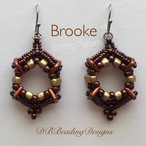 May include: A pair of gold and brown beaded earrings with a hexagonal shape and a silver hook. The earrings are labeled "Brooke Earring Pattern" and "DB Beading Designs".