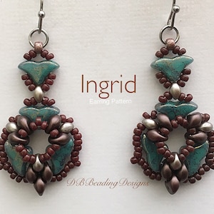 May include: Teal and brown beaded earrings with a silver accent. The earrings are in the shape of a circle with a teardrop-shaped pendant hanging from the bottom. The earrings are labelled "Ingrid Earring Pattern" and "DB Beading Designs".
