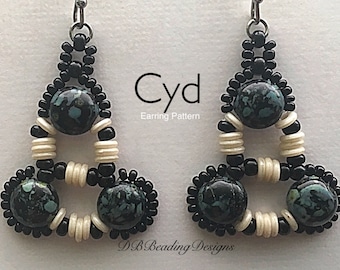 May include: Handmade beaded earrings with black beads and turquoise-colored stone accents. The earrings have a unique triangular design with the text "Cyd Earring Pattern" and "DB Beading Designs".