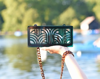 Jupiter acrylic clutch in translucent green