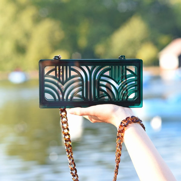 Jupiter acrylic clutch in translucent green