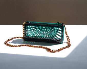 Phoebe acrylic clutch in translucent green