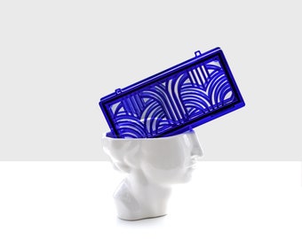 Jupiter acrylic clutch in translucent blue