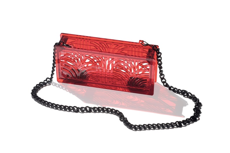 Jupiter acrylic clutch in translucent red image 7