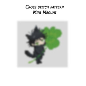 May include: Cross stitch pattern of a black cat holding a green four-leaf clover. The pattern is titled "Mini Megumi".