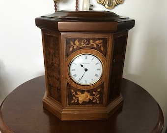 vintage music box with clock.