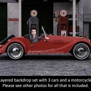 May include: A red vintage car with a child driver in a petrol station setting. The car has a white stripe along the side and chrome wheels. There are two petrol pumps in the background with red star logos.