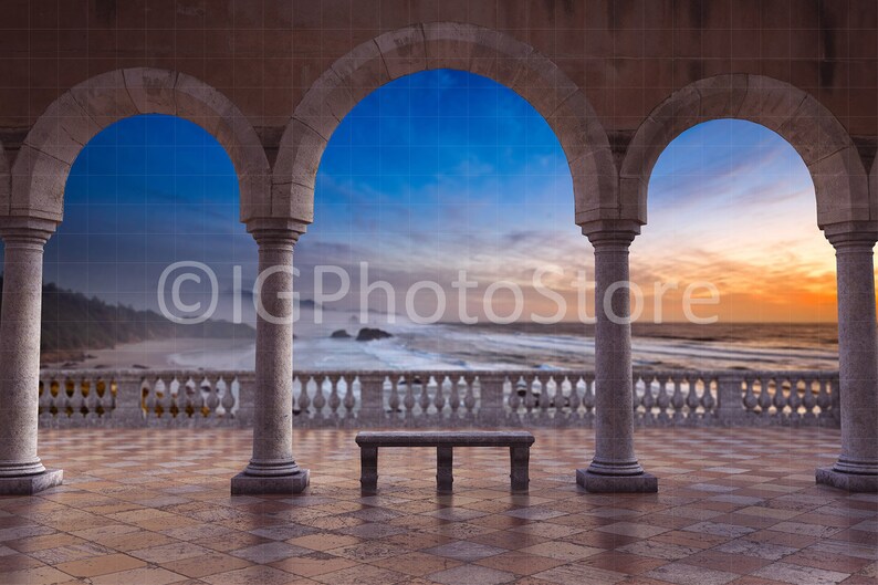 May include: A stone archway with three columns overlooking a beach scene with a wooden bench in the foreground. The sky is blue with white clouds and the ocean is a deep blue with white waves crashing on the shore.