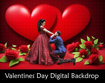 May include: A couple poses in front of a red heart-shaped backdrop with a floral arrangement of red roses. The woman is wearing a long red dress and the man is wearing a blue suit.