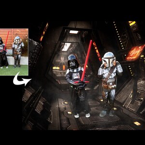 May include: Two children dressed as Star Wars characters, Darth Vader and The Mandalorian, stand in a dark, futuristic setting. The child dressed as Darth Vader holds a red lightsaber.