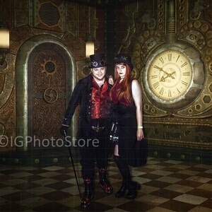 May include: A couple dressed in steampunk attire pose in front of a large clock and ornate door. The man wears a black jacket, red shirt, and top hat. The woman wears a black dress, top hat, and has long red hair.