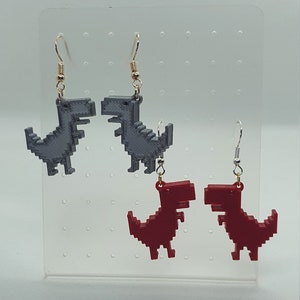 Boucles d'oreilles dinosaures hors ligne imprimées en 3D