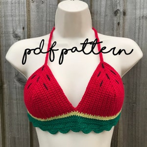 May include: A red, green and yellow crocheted bikini top with a watermelon design. The top has a halter style with a tie at the back of the neck. The text "pdf pattern" is written in black across the top of the image.