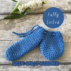 May include: A blue crocheted pouch with a long, narrow section and a rounder section. The pouch has a drawstring and the text "Fully tested" and "BASIC WILLY WARMER" is visible.