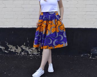 Jupe Ankara, violet et orange, jupe midi imprimé africain, tissu 100% coton wax. Jupe froncée. Jupe fleurie.