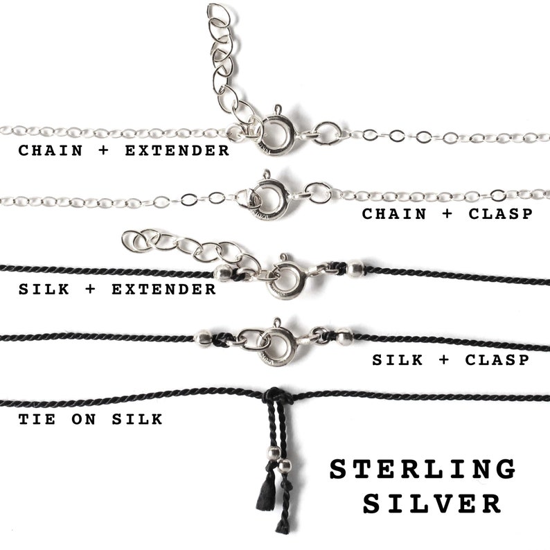 May include: Four different necklace styles with sterling silver clasps and extenders. The top two necklaces are silver chains, the bottom two are black silk cords. The text "CHAIN + EXTENDER", "SILK + EXTENDER", "TIE ON SILK", "CHAIN + CLASP", and "SILK + CLASP" labels each style. The text "STERLING SILVER" is at the bottom of the image.