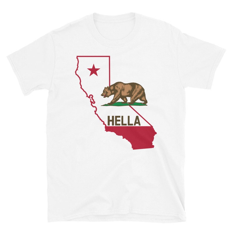 May include: White t-shirt with a graphic of the California state outline, a bear, a star, and the word "HELLA".