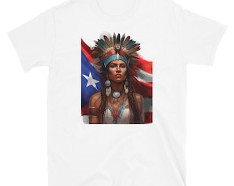 May include: A white t-shirt with a colorful image of a woman wearing a headdress and traditional clothing. The woman is standing in front of a red, white, and blue flag with a white star.