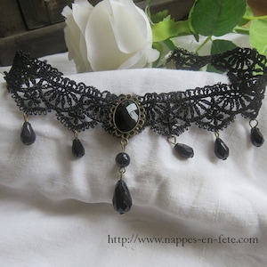 Gothic necklace in black lace with round beads and medallion