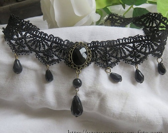 Gothic necklace in black lace with round beads and medallion