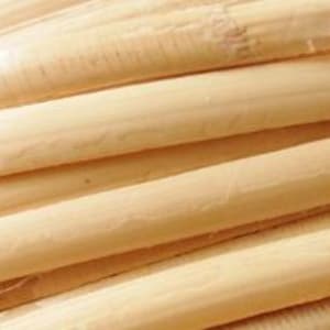 May include: Close-up of natural, unpainted, beige-coloured rattan cane, a material used for weaving baskets and furniture.