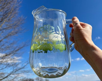 Vintage glass pitcher with flower / morning glory (?) design; 1940s or 1950s