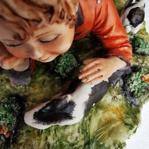 Original vintage Italy capodimonte porcelain figurine, boy with rabbits, made in 1996, singed by artist R. Guidolin