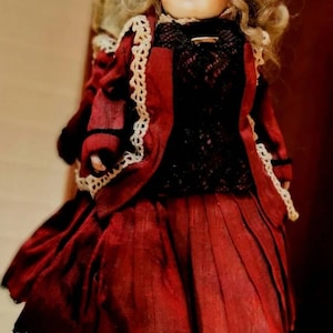 A Vintage   &#39;Bell Ceramics Inc , BRU &#39;  Bishop Porcelain Doll, 22 cm tall.