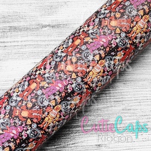 May include: Black and white checkered fabric with a colorful print of cartoon characters, pizza slices, and lightning bolts. The characters are brown, pink, and yellow.